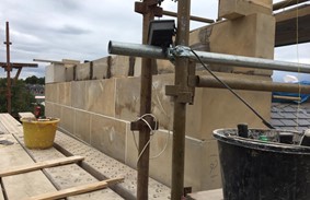 Chimney Rebuild With Natural Stone